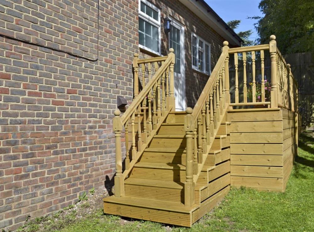 Steps to decking at Little Longmead in Findon, near Worthing, West Sussex