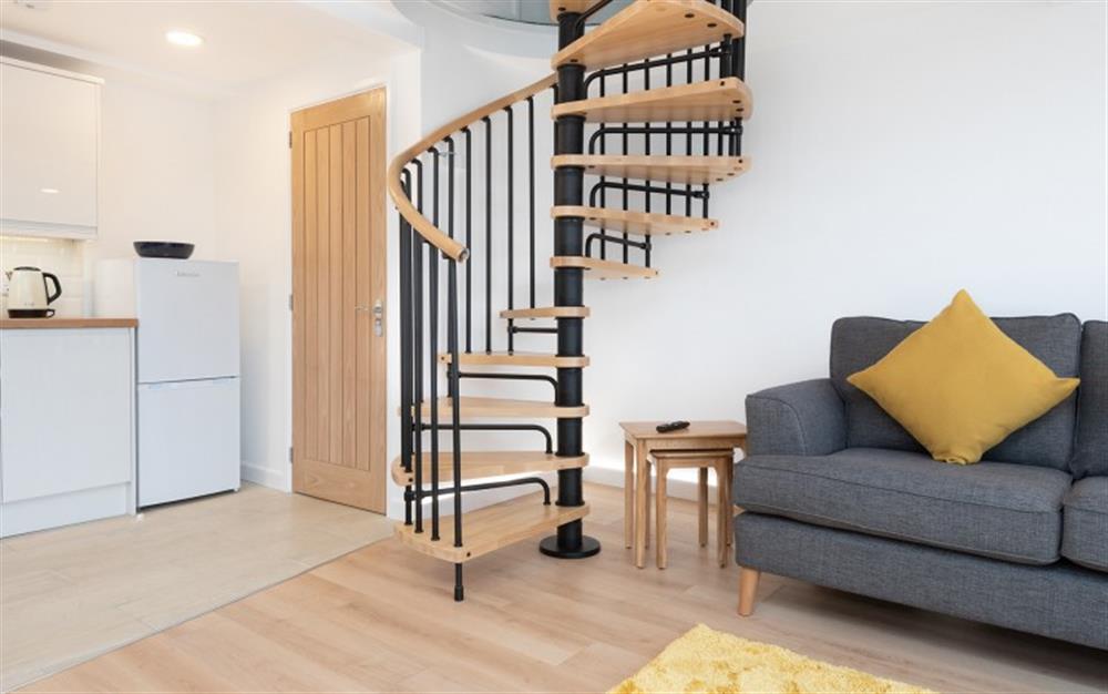 Access to bedroom by spiral staircase at Little Lucerne in Lyme Regis
