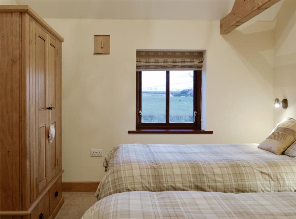 Comfortable twin bedroom at Little Meadow in Dearham, near Maryport, Cumbria