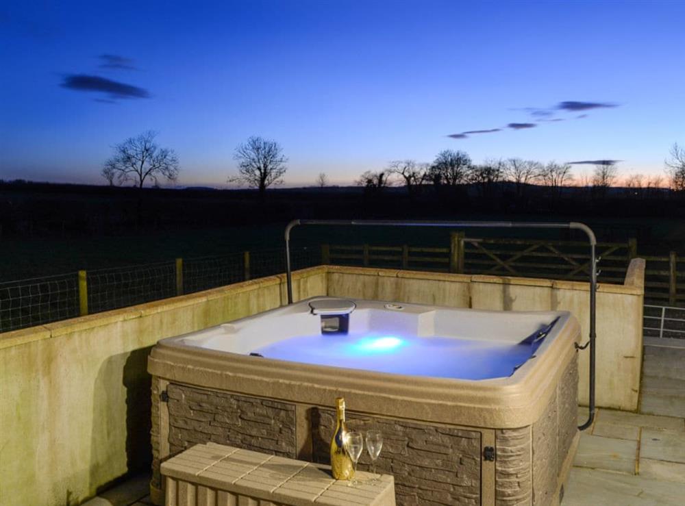 Relaxing hot tub with illumination at Little Meadow in Dearham, near Maryport, Cumbria