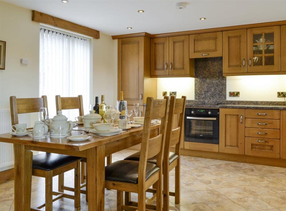 Spacious kitchen with dining area at Little Meadow in Dearham, near Maryport, Cumbria