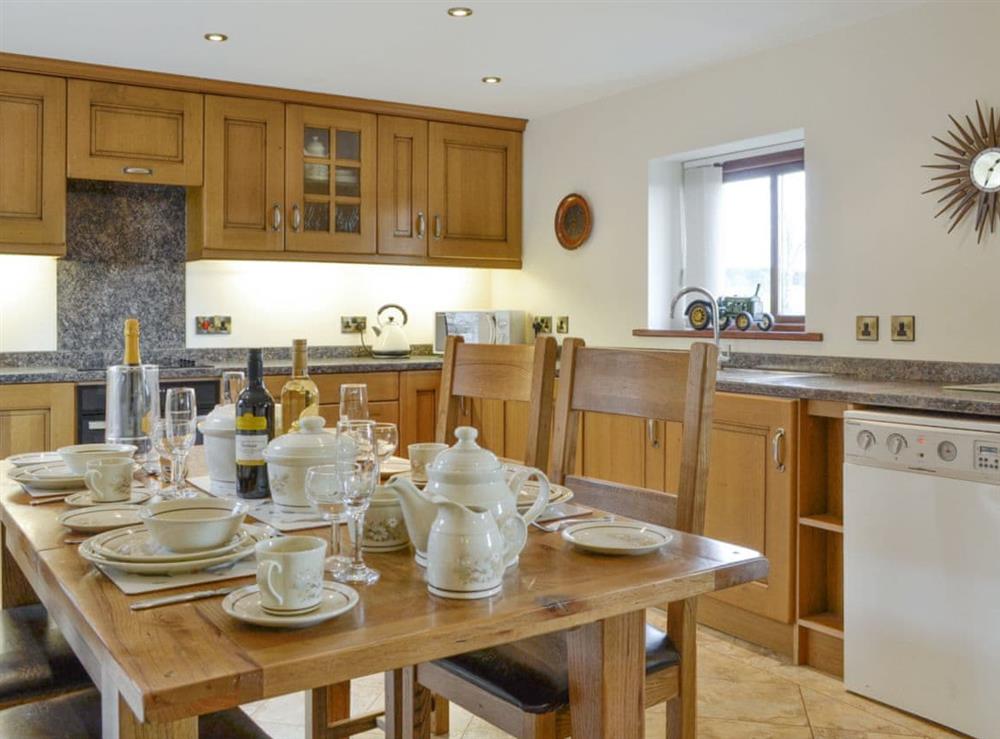 Well-equipped kitchen with dining area at Little Meadow in Dearham, near Maryport, Cumbria