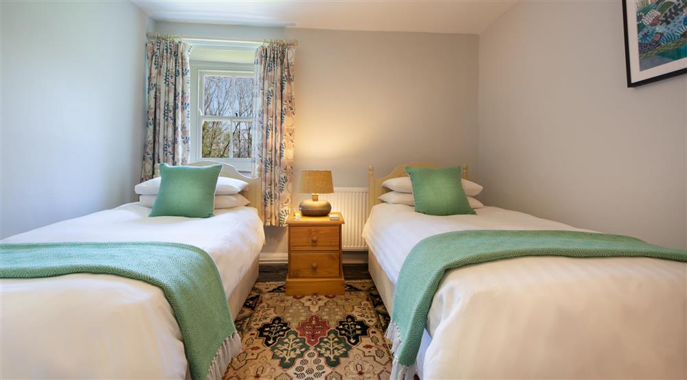 The twin bedroom at Little Milford Farmhouse in Haverfordwest, Pembrokeshire