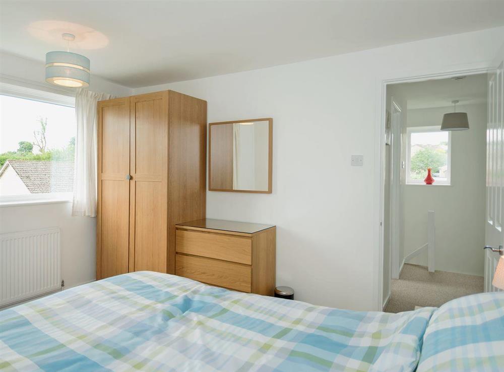 Charming double bedroom with kingsize bed at Little Orchard in High Littleton, near Bath, Avon