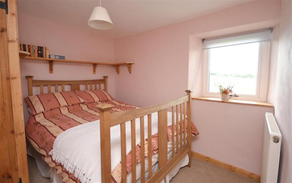 The smaller double bedroom is at the rear at Little Perhay in Bridport