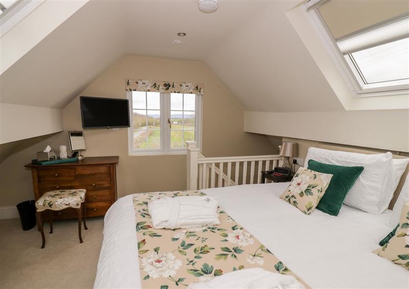 One of the bedrooms at Little Perry at Perrywood End, Pirton near Wadborough