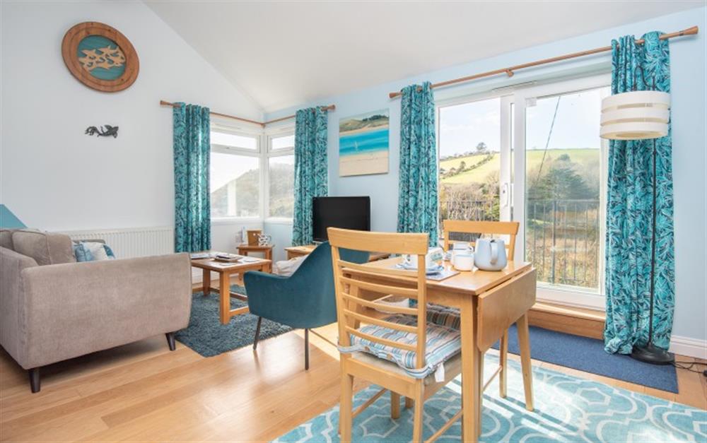 The dual aspect living space with sea and countryside views at Little Phoenix in Talland Bay