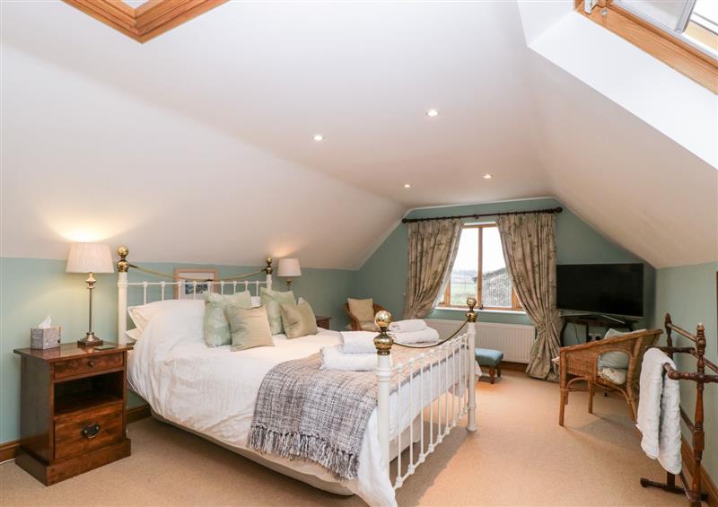 A bedroom in Little Stables Cottage at Little Stables Cottage, Spetisbury near Blandford Saint Mary