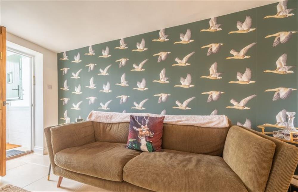 Entering the sitting room with geese on the wall!