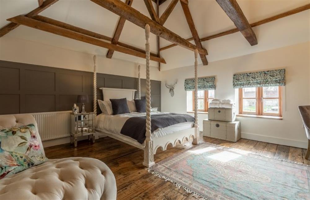 First floor:  Master bedroom with vaulted beamed ceiling at Little Star, Ringstead near Hunstanton