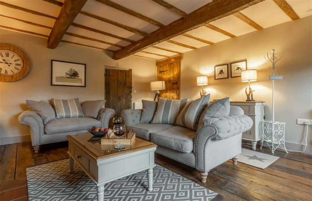 Ground floor:  Sitting room with wood floors at Little Star, Ringstead near Hunstanton