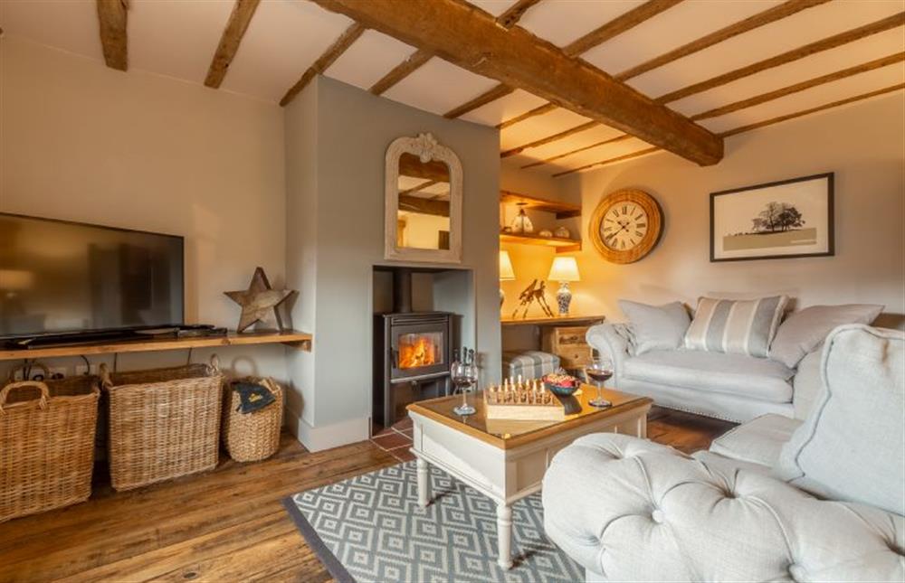 Ground floor:  Spacious sitting room with flatscreen television at Little Star, Ringstead near Hunstanton