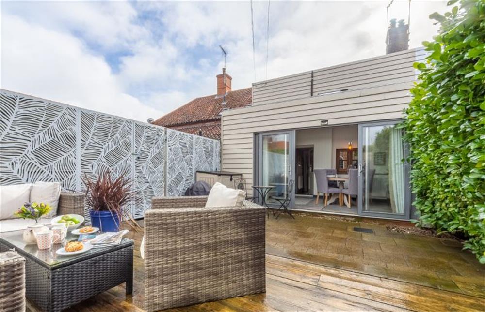 Rear Garden:  With raised seating area at Little Star, Ringstead near Hunstanton