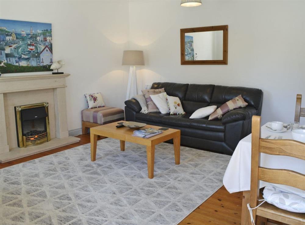Welcoming living/dining room (photo 2) at Little Tamarisk in Padstow, Cornwall
