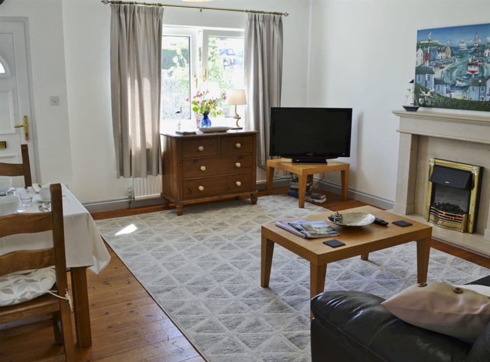 Welcoming living/dining room at Little Tamarisk in Padstow, Cornwall