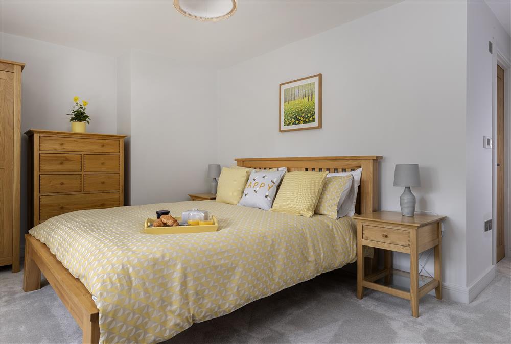 First floor: Bedroom one with a 5ft king-size bed at Little Tithe, Moreton-in-Marsh