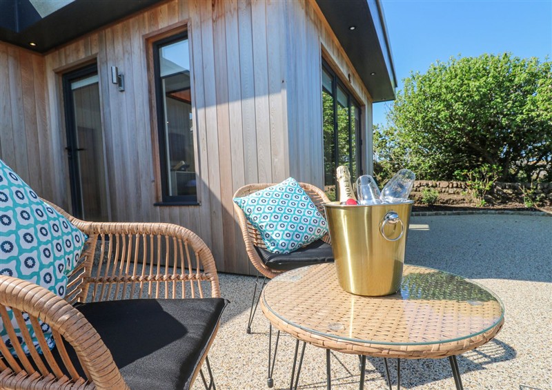 Enjoy a glass of wine on the patio at Little Victory, Pendeen