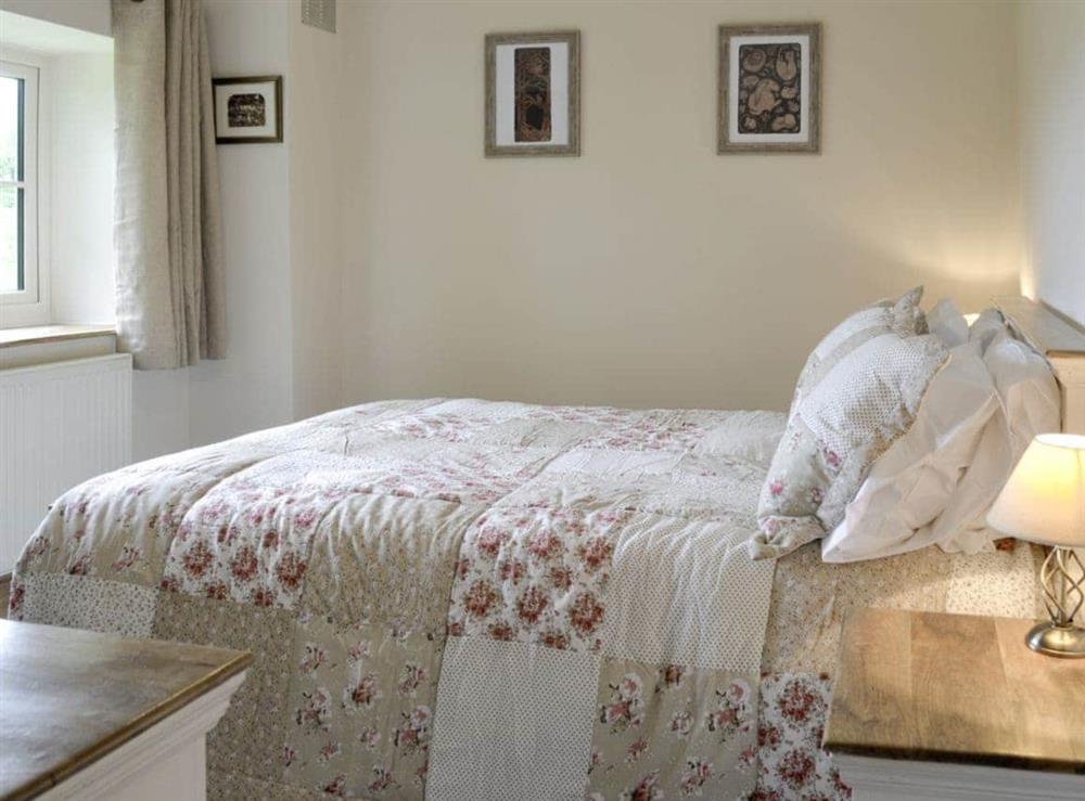 Comfortable double bedroom at Little Warham Cottage in Beaford, near Torrington, Devon