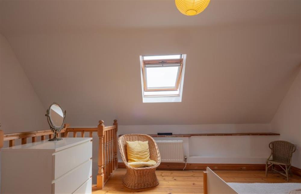 First floor: Bedroom two has an en-suite shower room at Little Wells, Burnham Overy Staithe near Fakenham