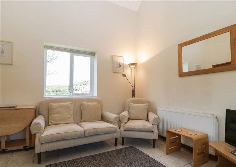 Relax in the living area at Little Wharf, Bleadon