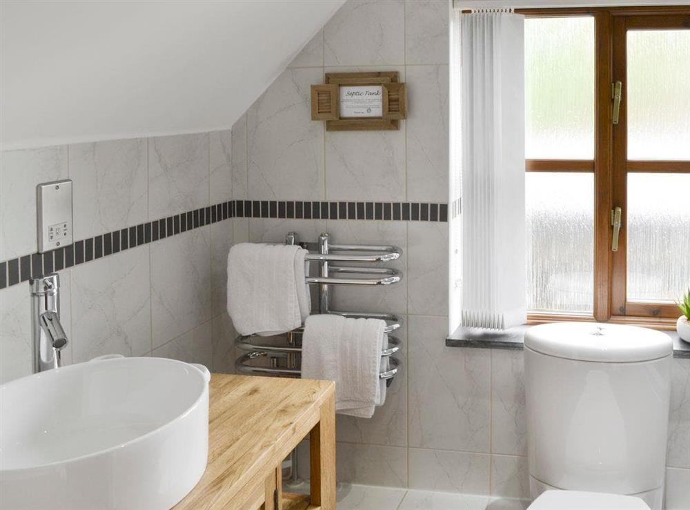 Stylish fitments and a heated towel rail in bathroom at Little Willow in Ruthvoes, near St Columb, Cornwall., Great Britain