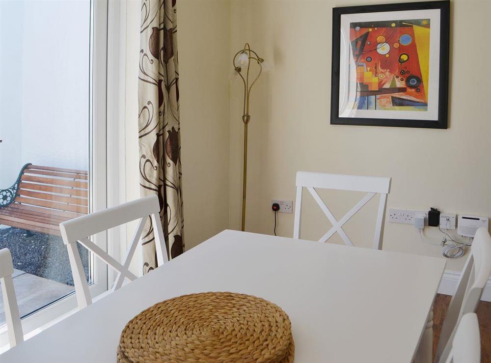 The dining room has direct access to the courtyard at Little Woodlands Amble in Amble, Northumberland
