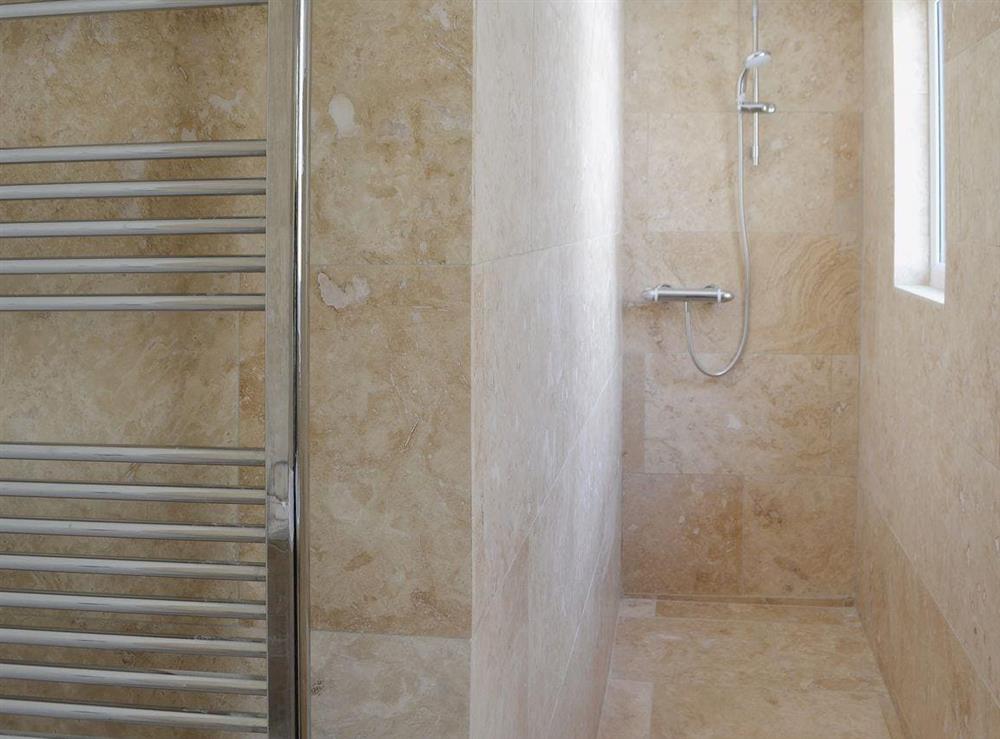The wet room also has a shower and heated towel rail at Little Woodlands Amble in Amble, Northumberland