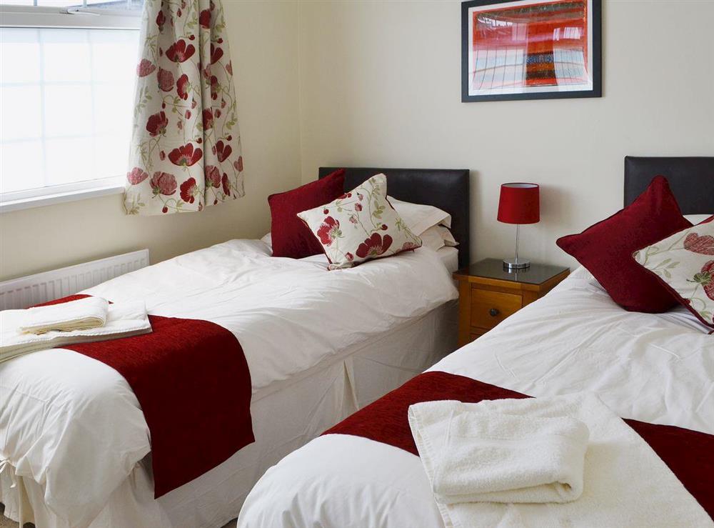 Well decorated and furnished twin bedroom at Little Woodlands Amble in Amble, Northumberland
