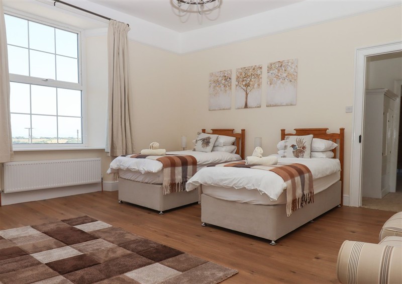 One of the 3 bedrooms at Littleham Court Manor, Littleham near Bideford