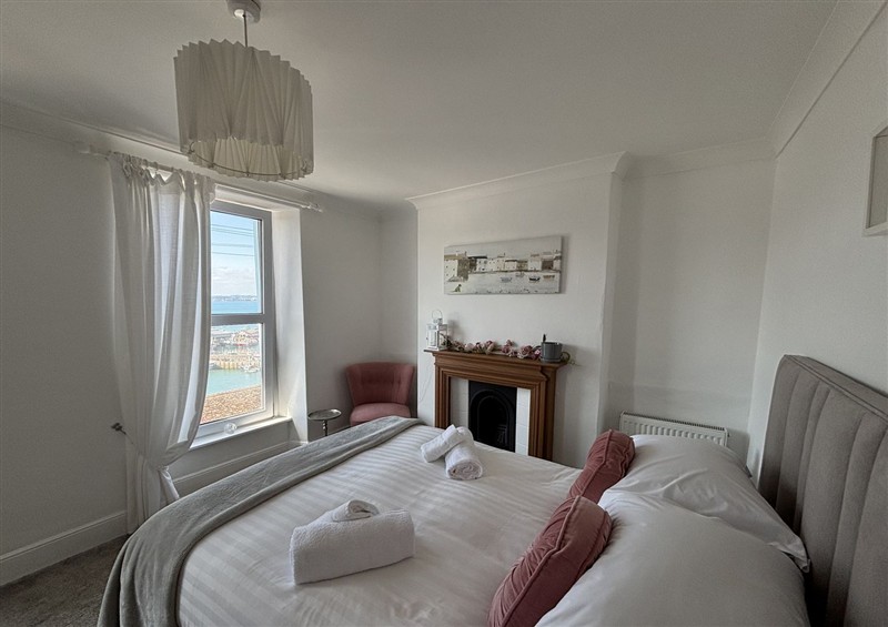 One of the bedrooms at Lizzys Cottage, Brixham
