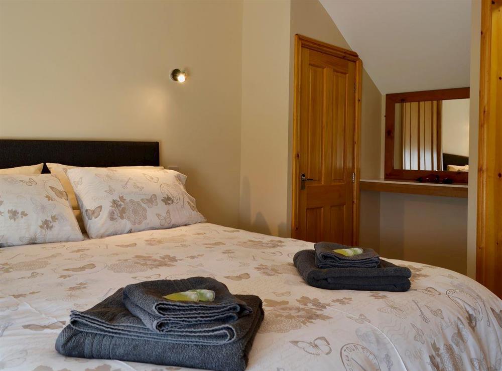 Double bedroom with en-suite shower room at Llain Gam in Llaneilian, near Amlwch, Gwynedd