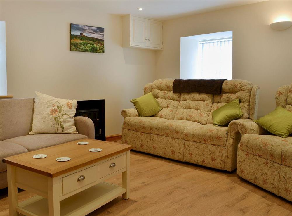 Warm and welcoming living room (photo 2) at Llain Gam in Llaneilian, near Amlwch, Gwynedd