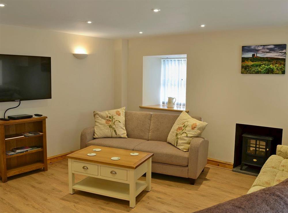 Warm and welcoming living room at Llain Gam in Llaneilian, near Amlwch, Gwynedd