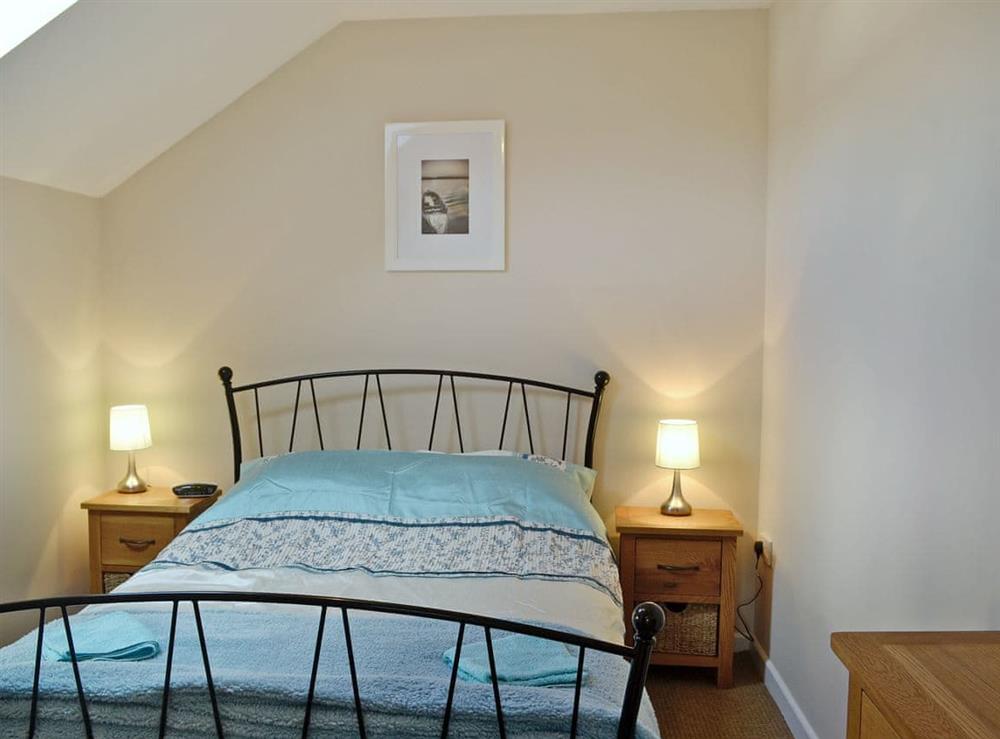 Comfortable double bedroom at Llandremor Fawr Cottage in Swansea, West Glamorgan