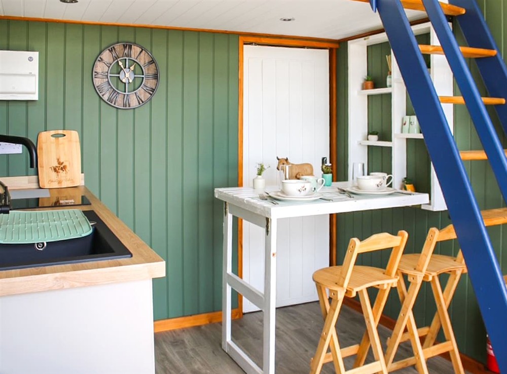 Kitchen/diner at Llandremor Fawr Lodge in Pontarddulais, West Glamorgan