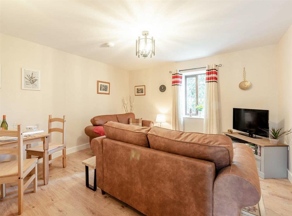 Living room/dining room at Llanfair Hill Cottage in Gorsgoch, Dyfed