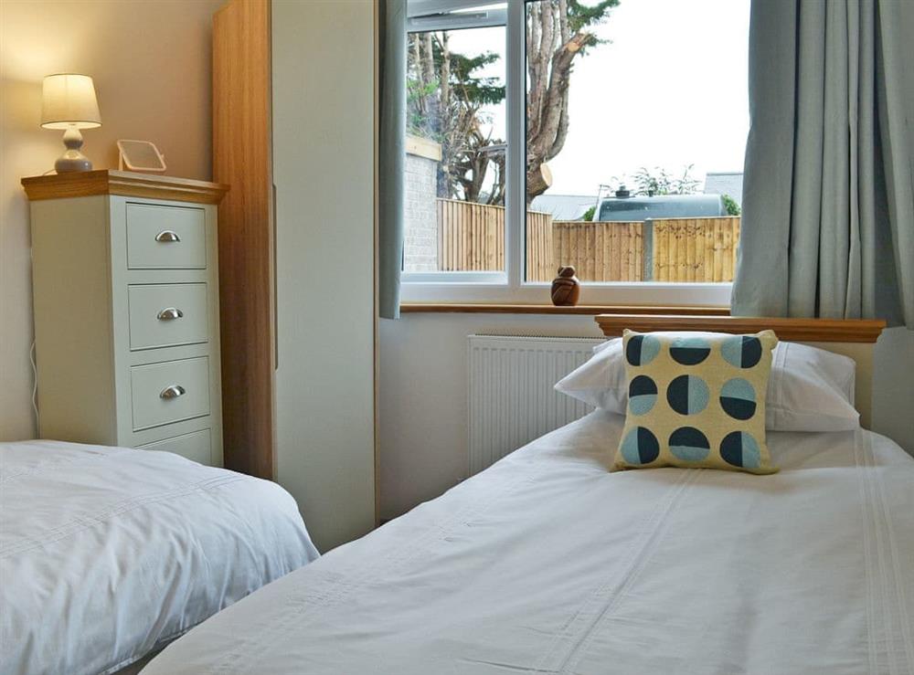 Charming twin bedroom at Lle Clyd in Harlech, near Porthmadog, Gwynedd