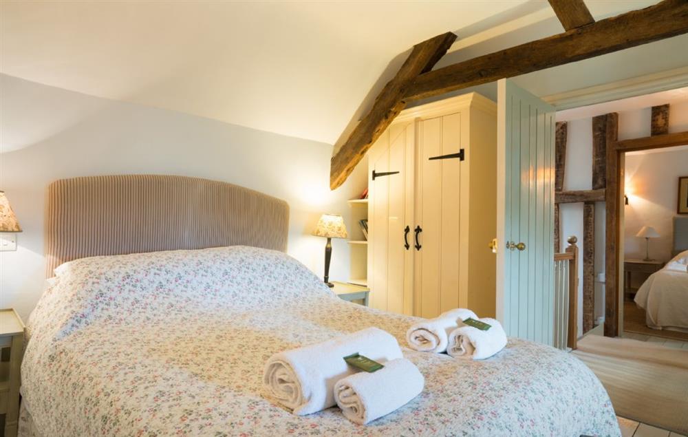 First floor:  Bedroom one with a 5ft king-size bed at Lletty, Bodnant Estate, Colwyn Bay