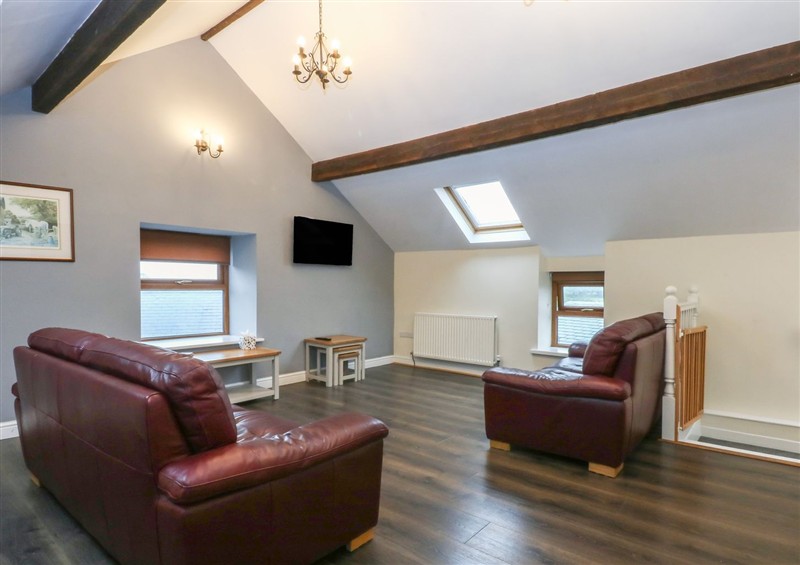 Relax in the living area at Llofft Yr Yd, Porthmadog