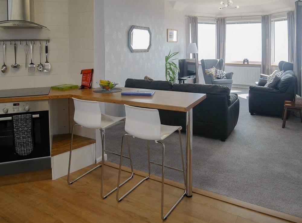 Spacious open plan living space at Lloyds Cottage in Portland Bill, near Portland, Dorset