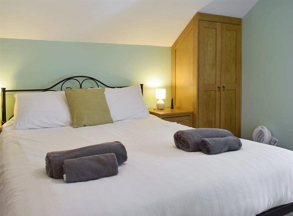 Relaxing en-suite double bedroom at The Cow Shed, 