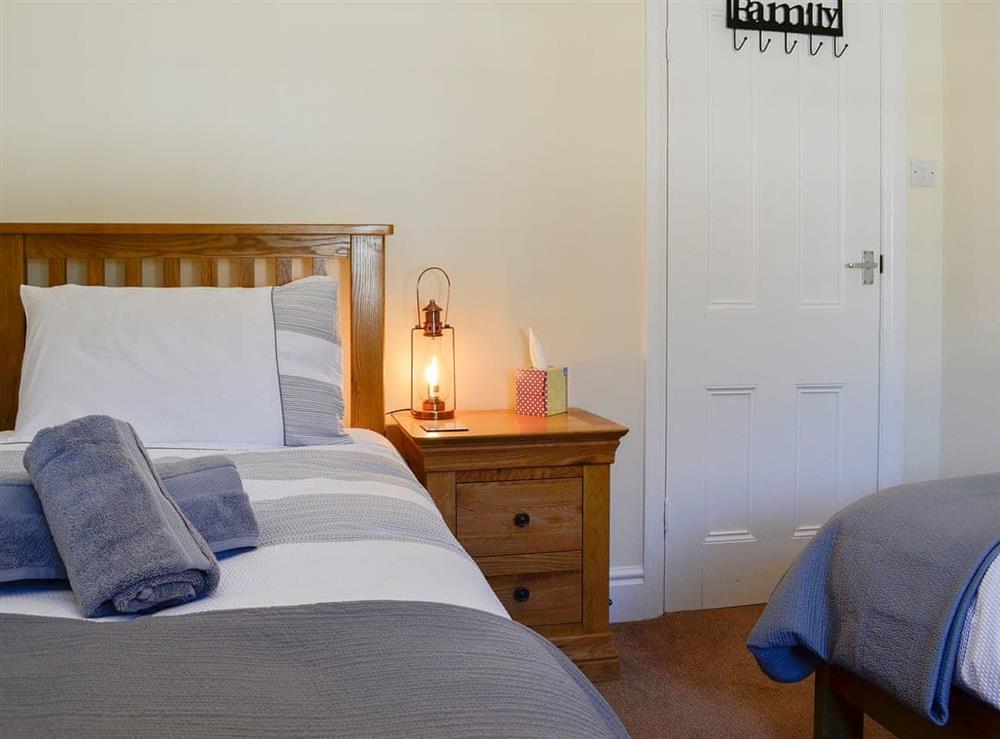 Comfortable twin bedroom at Llwynon Cottage in Llandudno, Conwy, Gwynedd