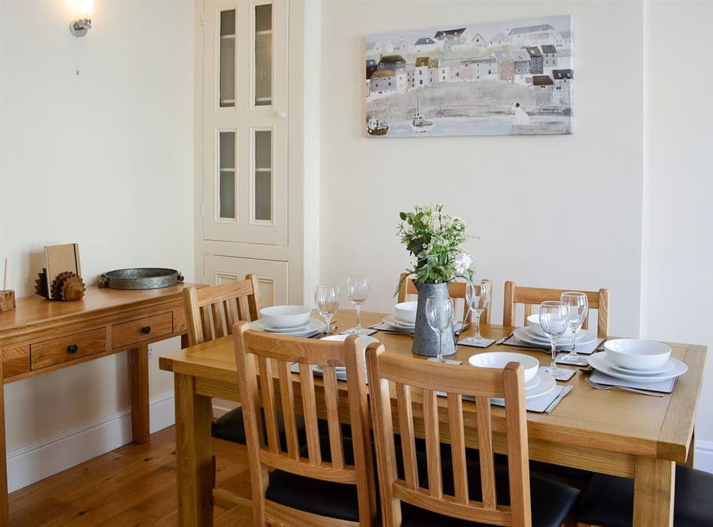 Dining room with lovely furniture at Llwynon Cottage in Llandudno, Conwy, Gwynedd
