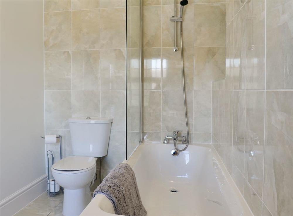 Ensuite with shower over the bath