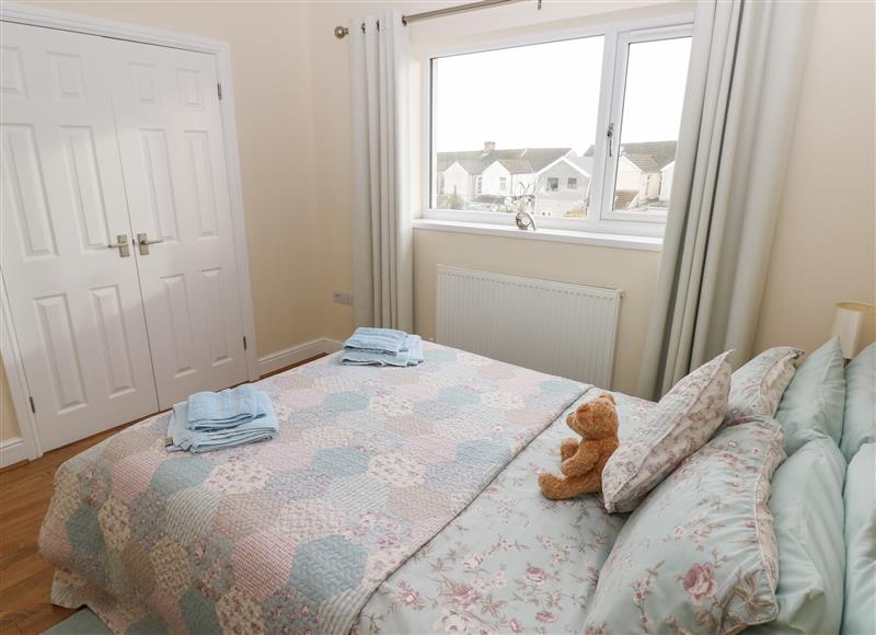 One of the bedrooms at Llygad Yr Haul (Sun), Burry Port