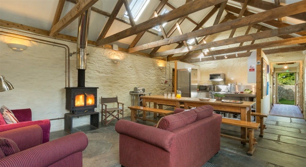 Open plan sitting / dining / kitchen area, Penrose Bunkhouse, Cornwall at Llyndy Bothy in Beddgelert, Gwynedd