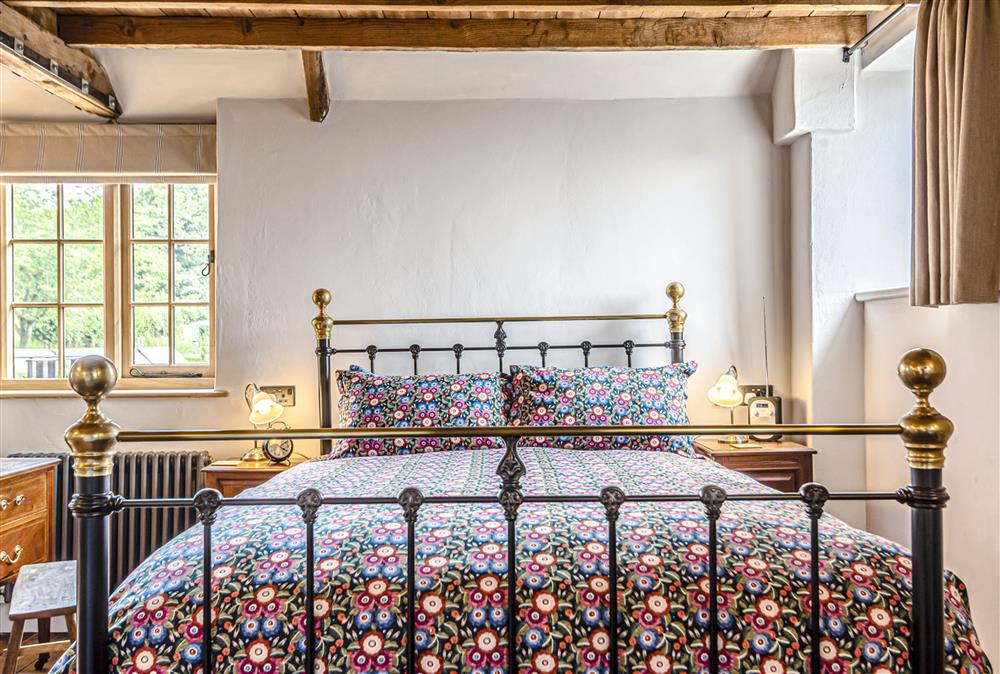 The comfortable bedstead with stylish bedding at Loaf, Bridport