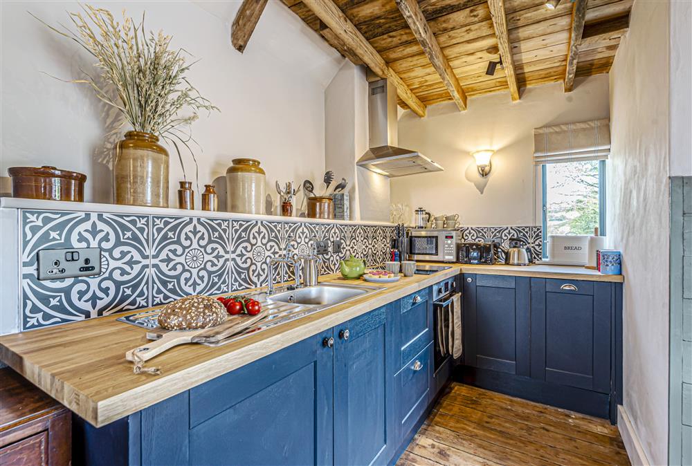 The well-equipped kitchen offers plenty of space for your meal preparation at Loaf, Bridport