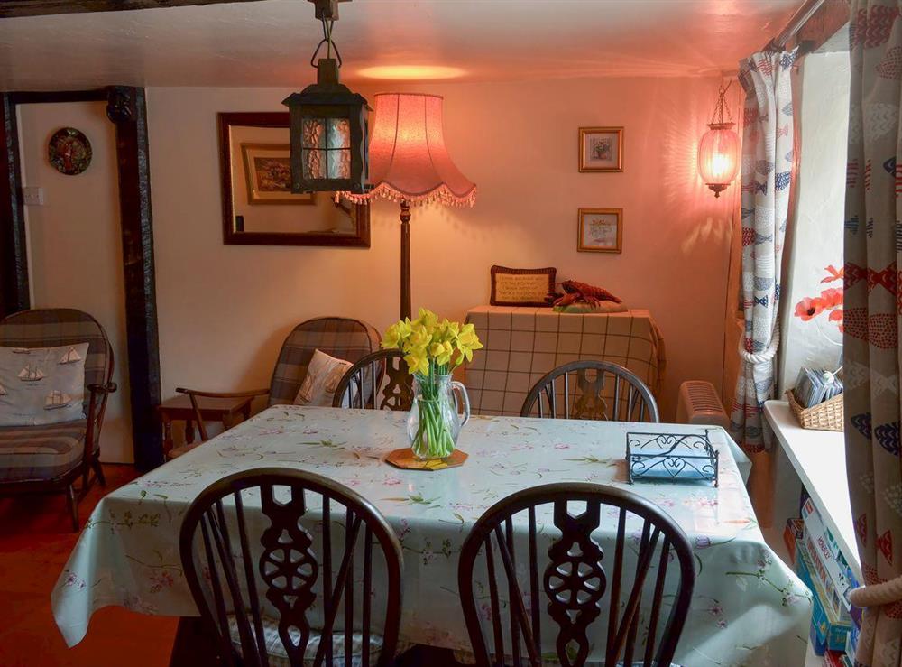 Cosy living and dining area (photo 3) at Lobster Cottage in Holcombe, near Dawlish, Devon