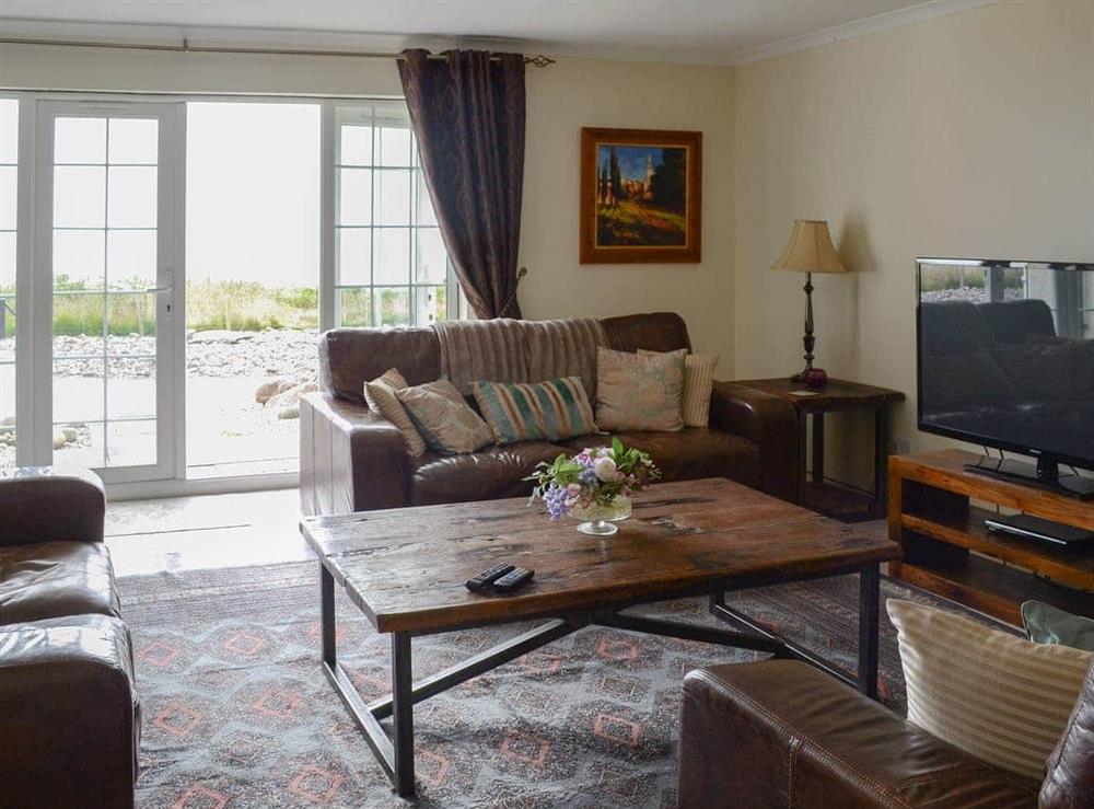 Light and airy living room with bay views at Lobster Ponds in Helmsdale, Highland